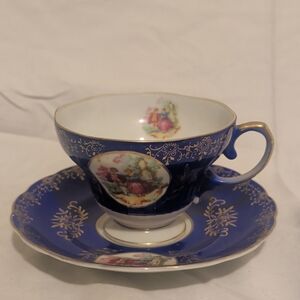 Elegant Blue and Gold Teacup and Saucer Set